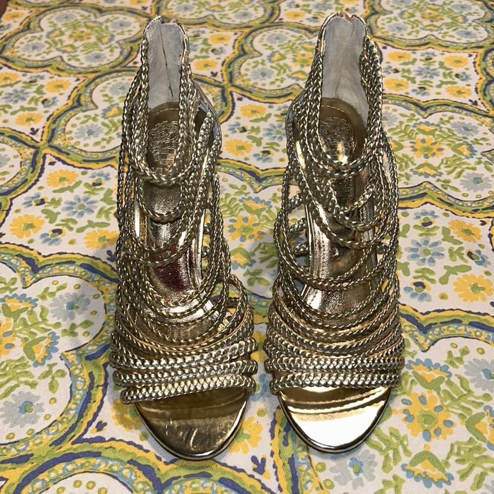 Gorgeous gold braided high heel sandals.